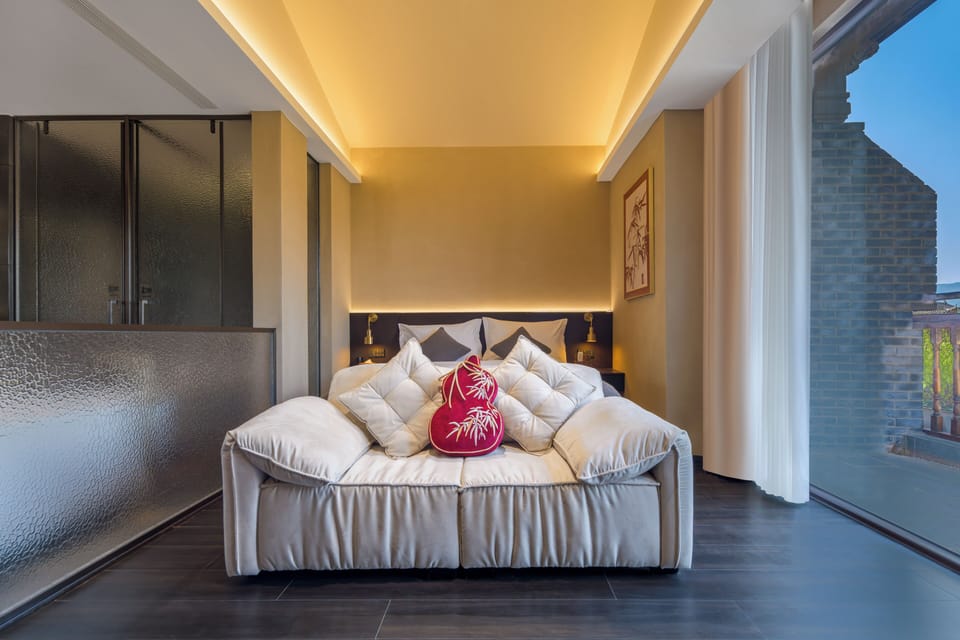 Luxury Double Room, Refrigerator, Lake View | Minibar (free items), desk, laptop workspace, WiFi (free)