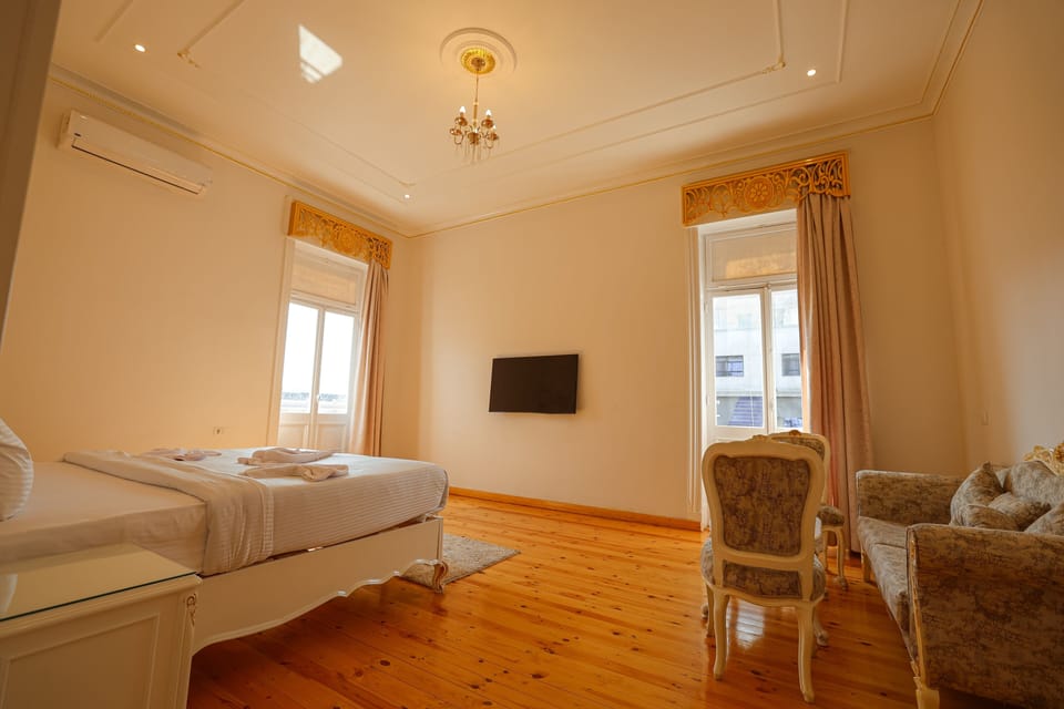 Classic Studio Suite, 1 King Bed, Balcony, City View | In-room safe, laptop workspace, blackout drapes, soundproofing
