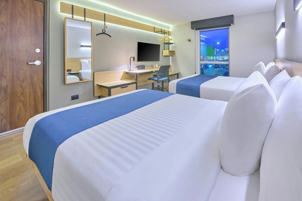 Standard Room, 2 Double Beds, City View | Desk, blackout drapes, iron/ironing board, free WiFi