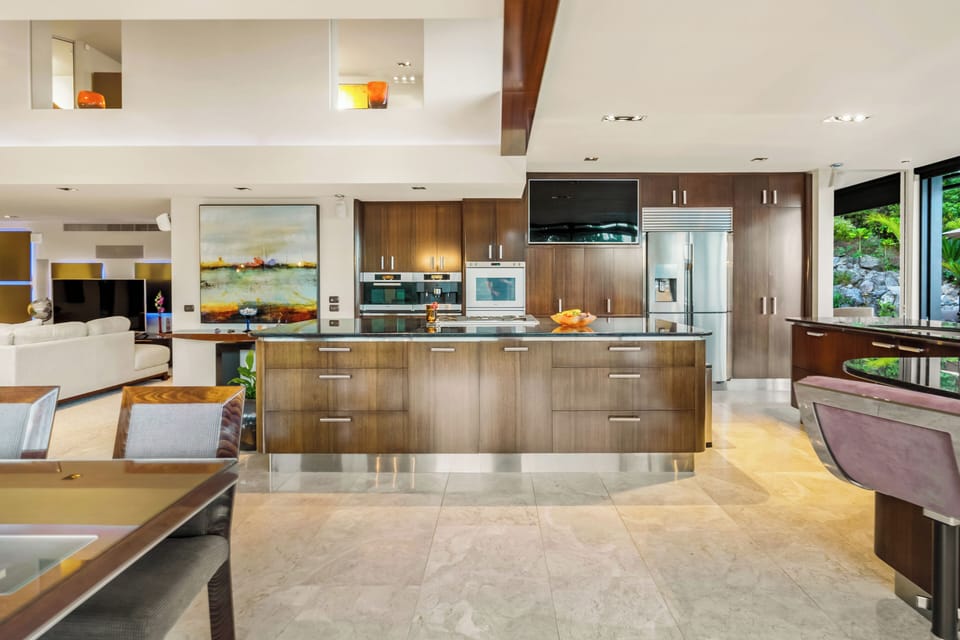 Luxury Suite, Oceanfront | Private kitchen | Full-size fridge, microwave, cookware/dishes/utensils, cleaning supplies