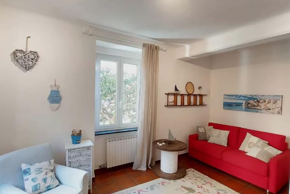 Apartment, Balcony, City View | Living area | 32-inch flat-screen TV with cable channels