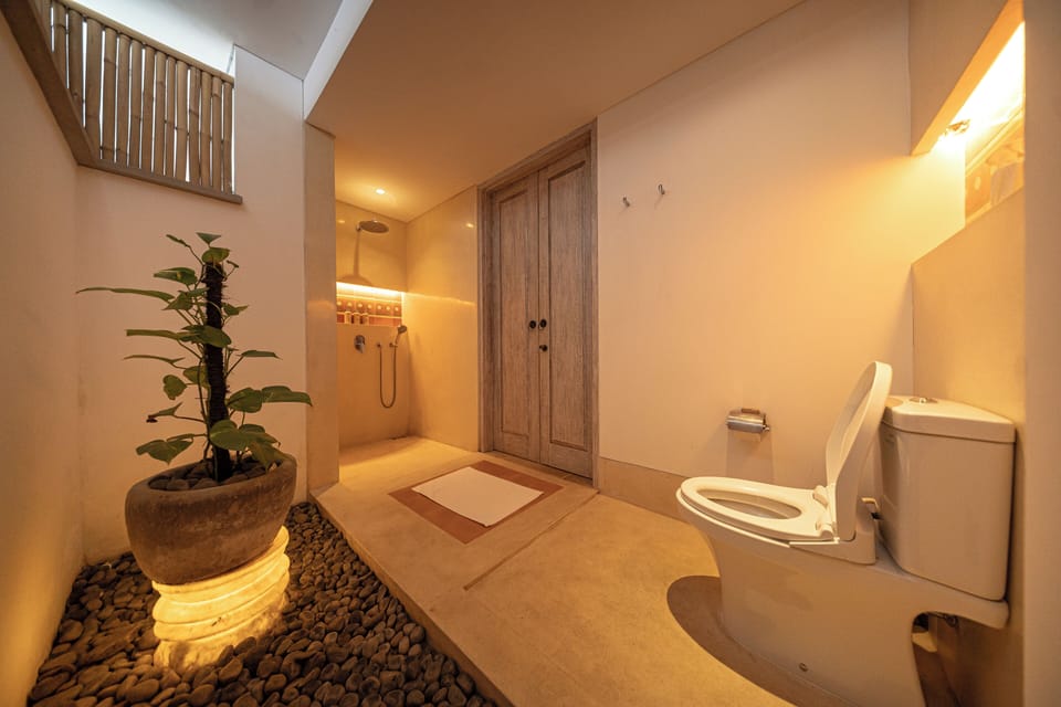 Separate tub and shower, rainfall showerhead, free toiletries