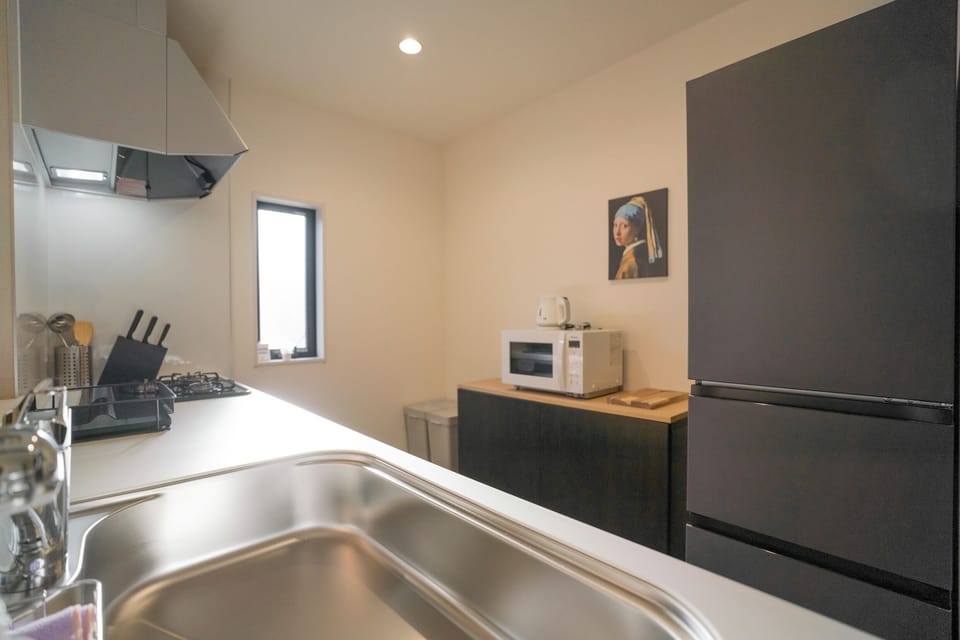 Luxury Villa | Private kitchen | Fridge, microwave, stovetop, dishwasher