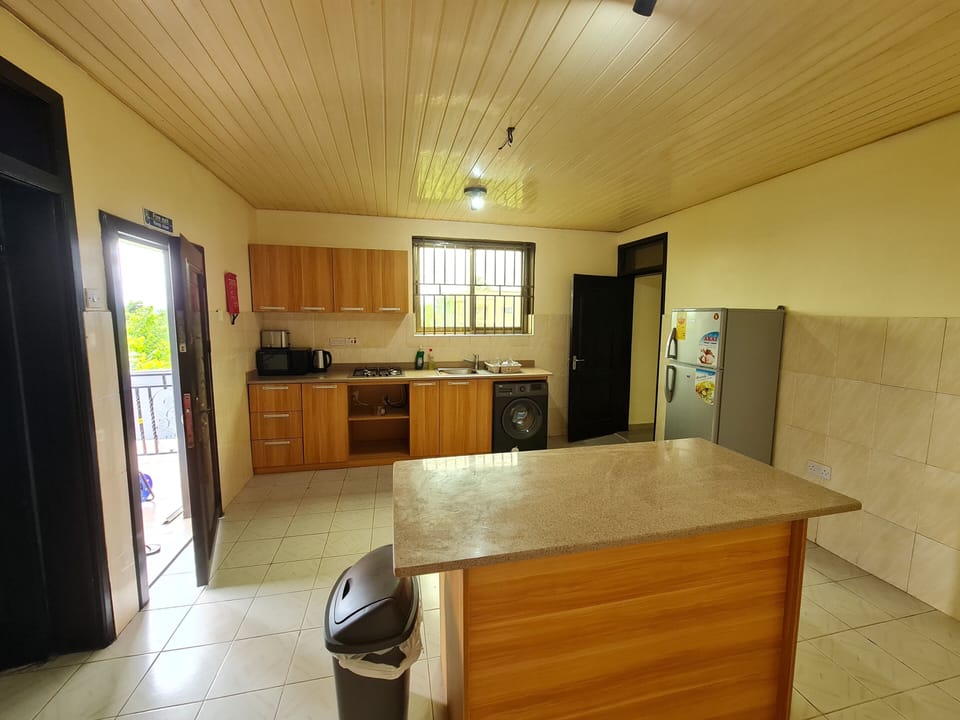 Full-size fridge, microwave, stovetop, toaster