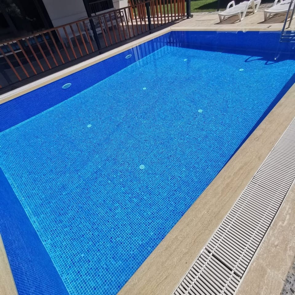 Outdoor pool, sun loungers