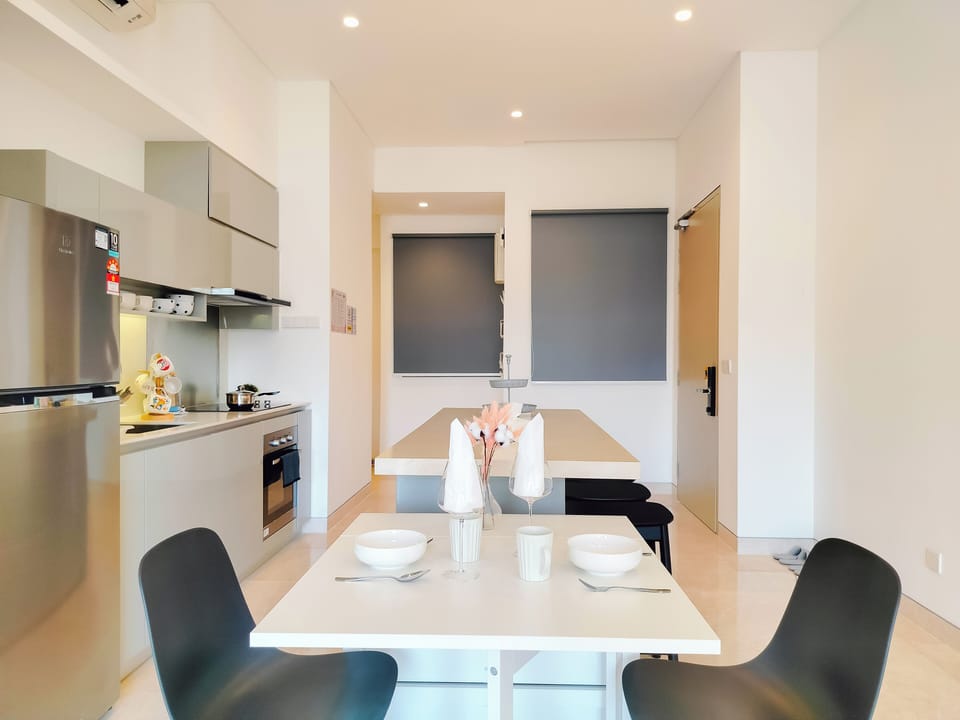 Apartment, 2 Bedrooms | Living area | 40-inch flat-screen TV with cable channels