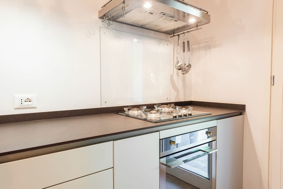 Comfort Apartment, Patio | Private kitchen | Fridge, stovetop, cookware/dishes/utensils