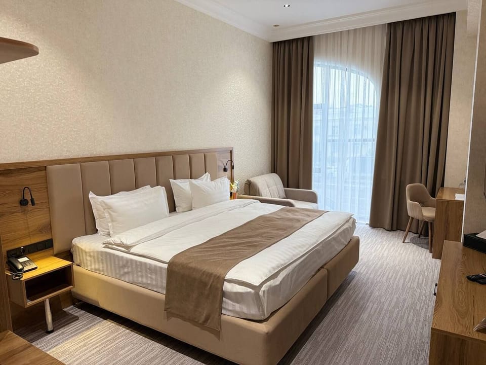 Superior Double Room, City View | Minibar, iron/ironing board (on request), WiFi (free), bed sheets