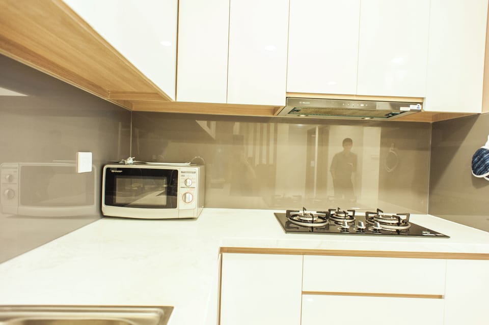 Luxury Apartment, City View | Desk, laptop workspace, iron/ironing board, free WiFi