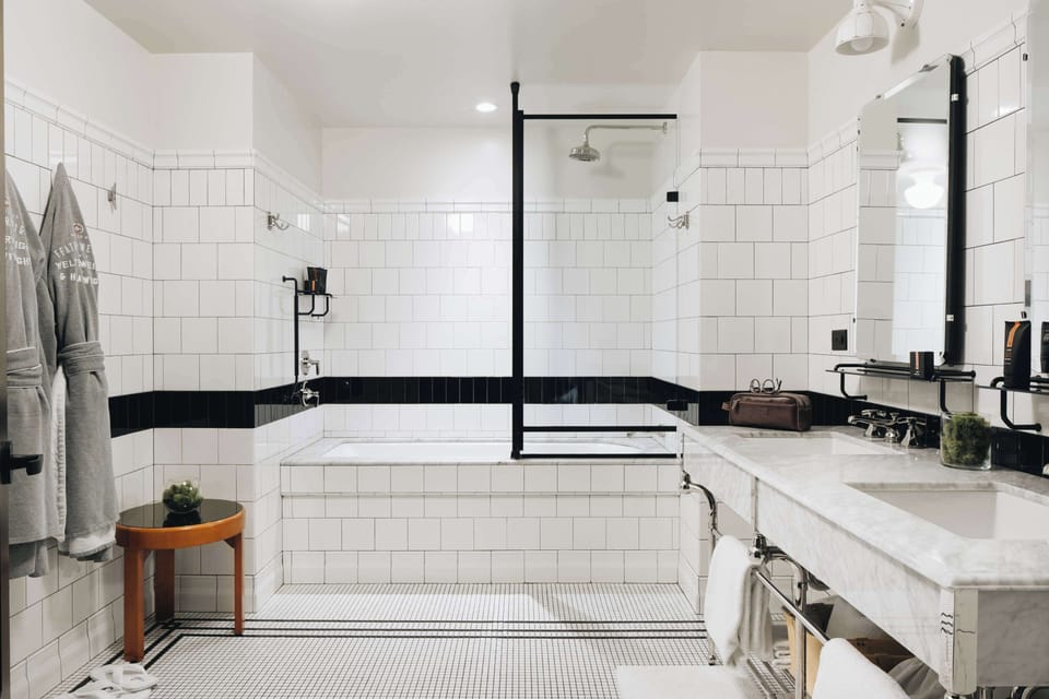 Junior Suite, 1 King Bed (Millennium View) | Bathroom | Shower, designer toiletries, hair dryer, bathrobes