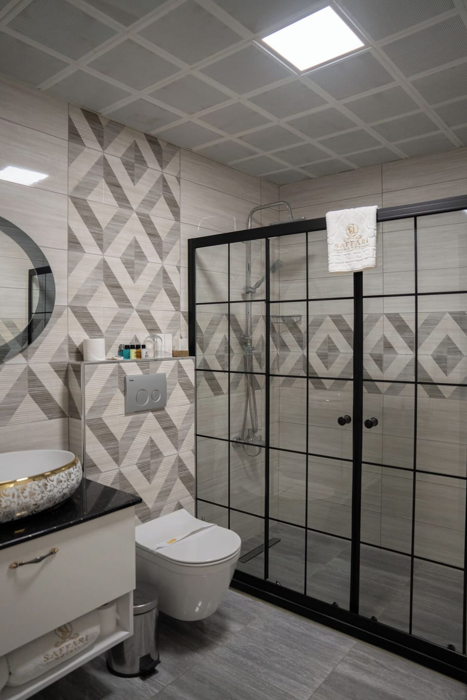 Shower, free toiletries, hair dryer, slippers