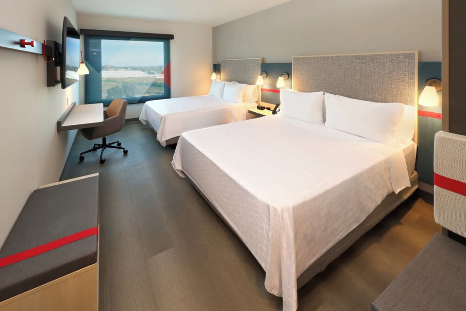 Hypo-allergenic bedding, in-room safe, desk, blackout drapes
