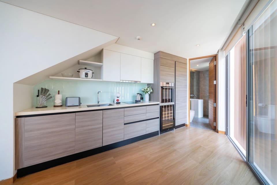 Luxury Condo, 2 Bedrooms, Balcony, Resort View | Private kitchen | Electric kettle, toaster
