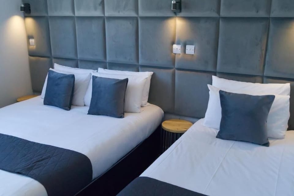 Deluxe Triple Room | Desk, soundproofing, iron/ironing board, free WiFi