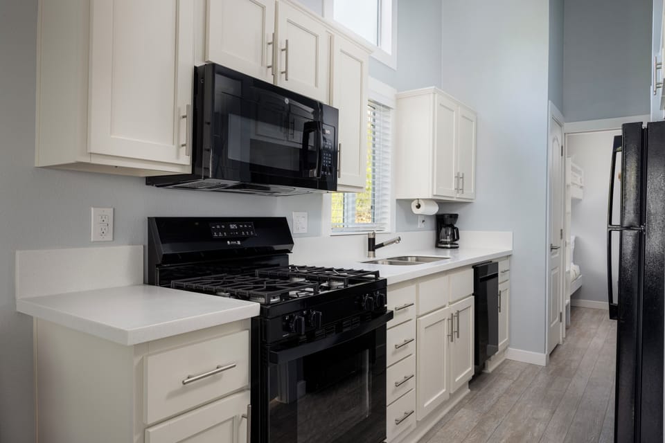 Lakeview Cottage w/ Lookout Deck | Private kitchen | Fridge, microwave, oven, stovetop