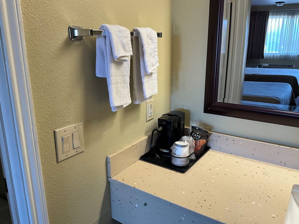 Desk, laptop workspace, blackout drapes, soundproofing