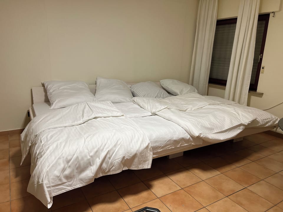 Deluxe Quadruple Room | Desk, blackout drapes, free WiFi