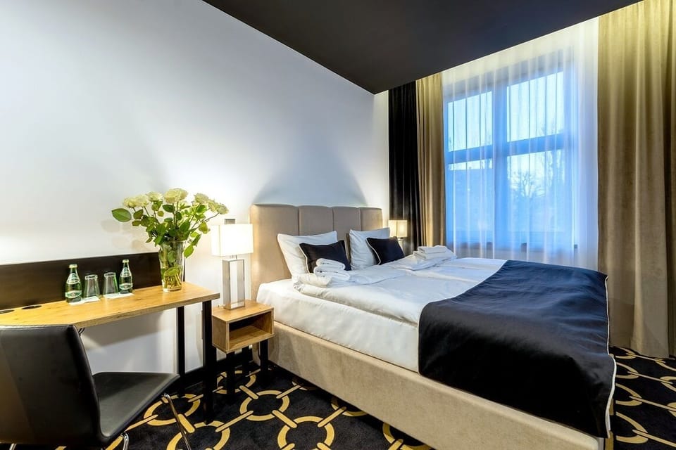 In-room safe, desk, laptop workspace, iron/ironing board