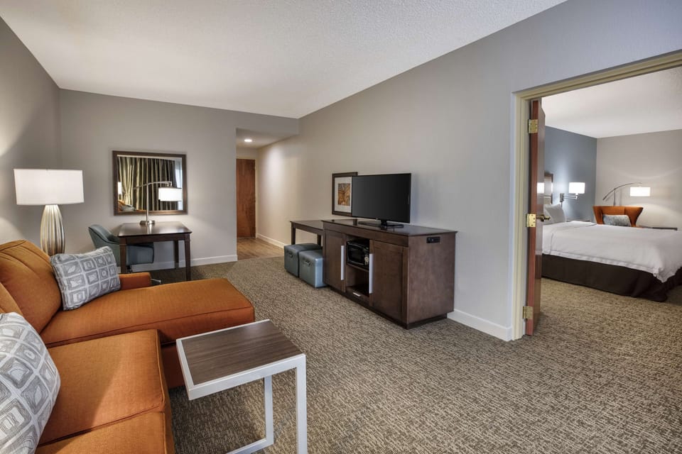 Suite, 1 King Bed, Non Smoking | Premium bedding, blackout drapes, iron/ironing board, WiFi (free)