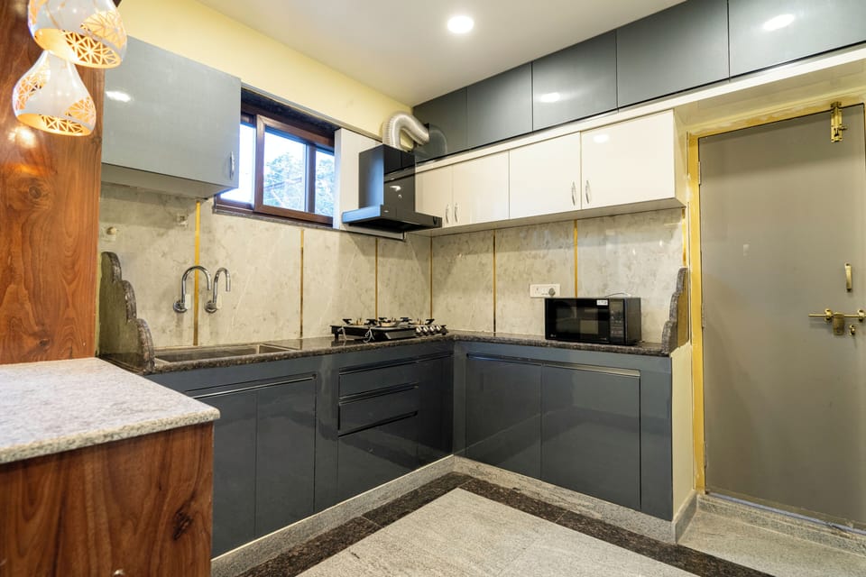Family Apartment, City View | Private kitchen | Shared fridge, microwave
