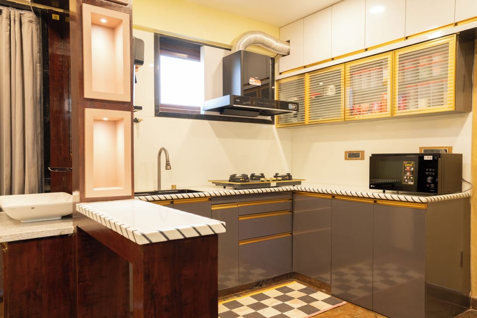 Presidential Suite, City View | Private kitchen | Shared fridge, microwave