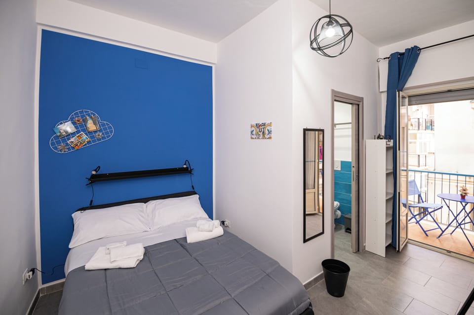Comfort Quadruple Room, Courtyard View | Minibar, individually decorated, individually furnished, free WiFi