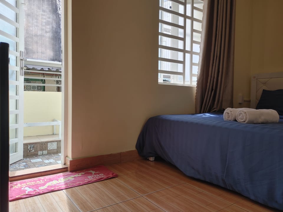 Deluxe Room, Balcony, City View | Iron/ironing board, free WiFi