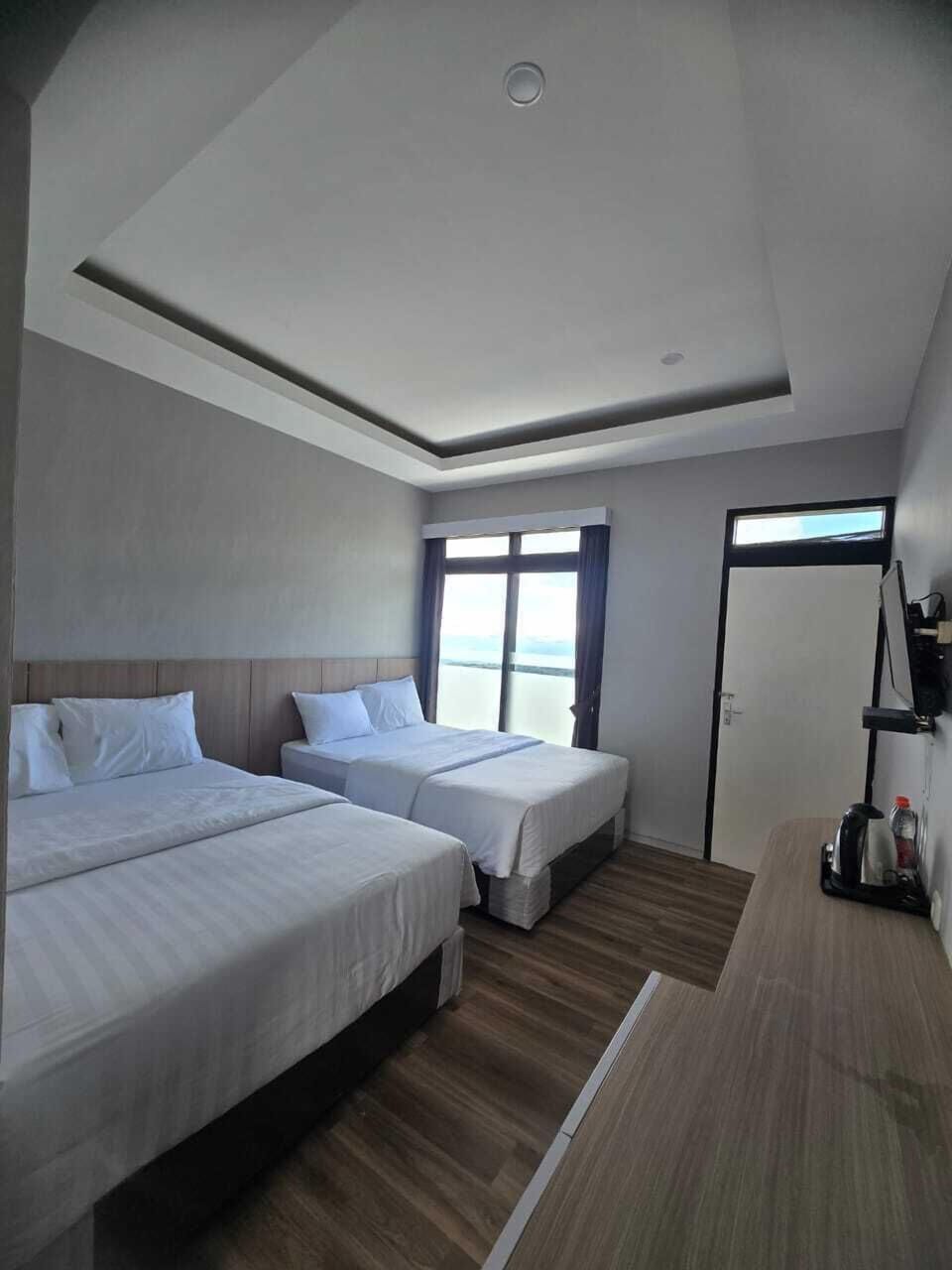 Business Quadruple Room, Balcony, Garden View | Egyptian cotton sheets, premium bedding, free WiFi