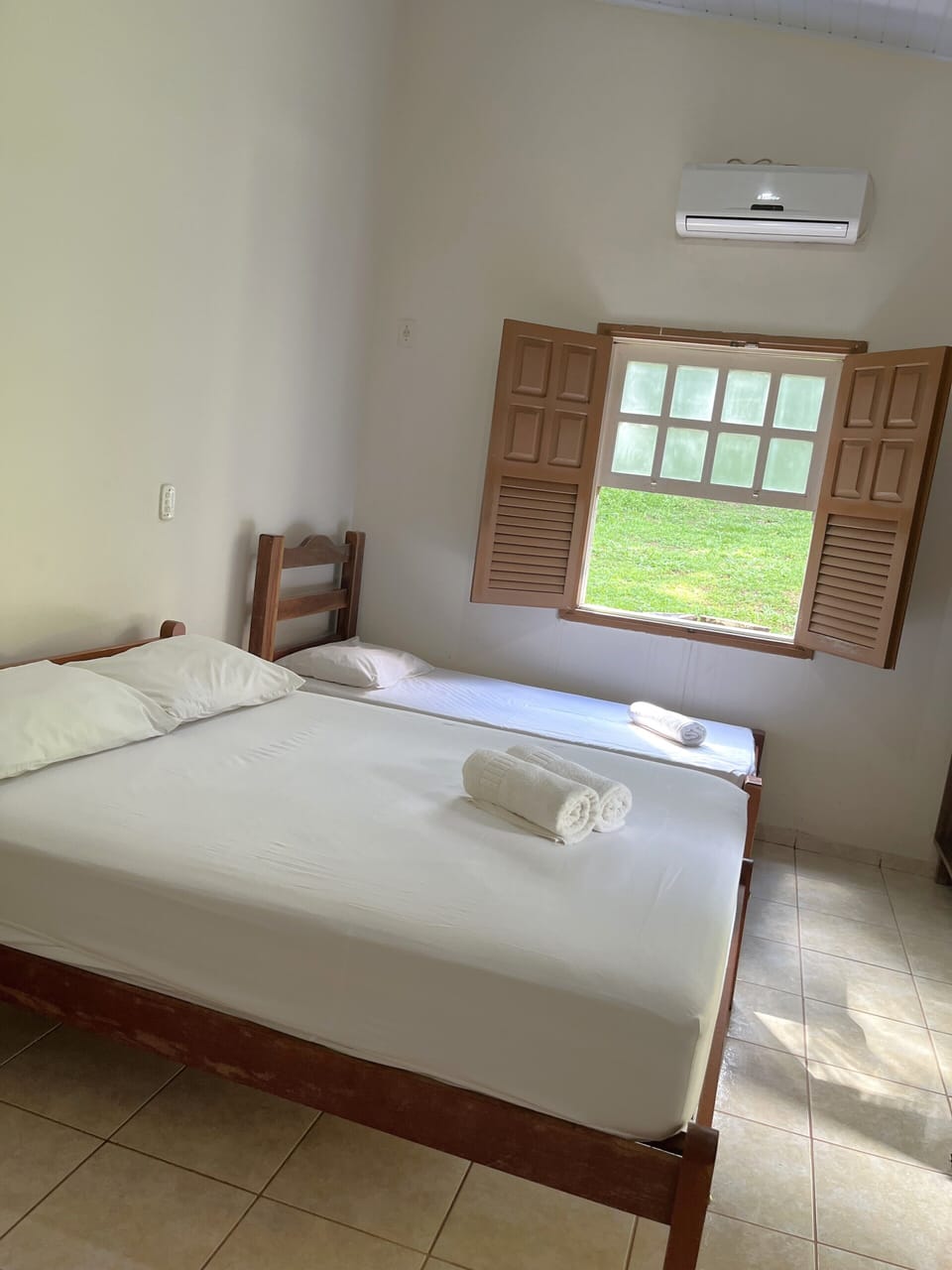 Standard Quadruple Room, Garden View | Individually furnished, free WiFi, bed sheets