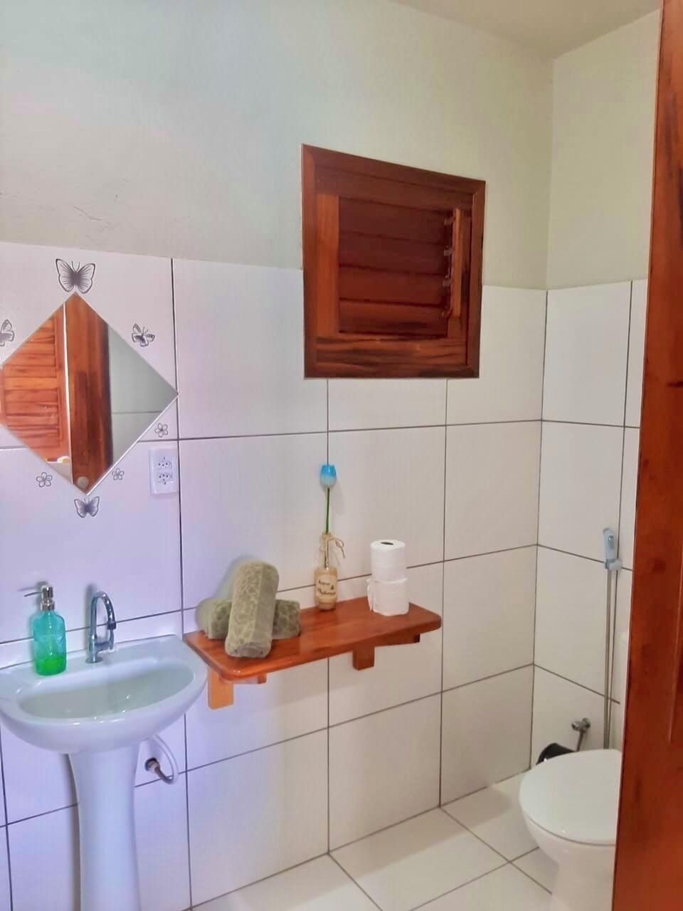Shower, towels, soap, toilet paper