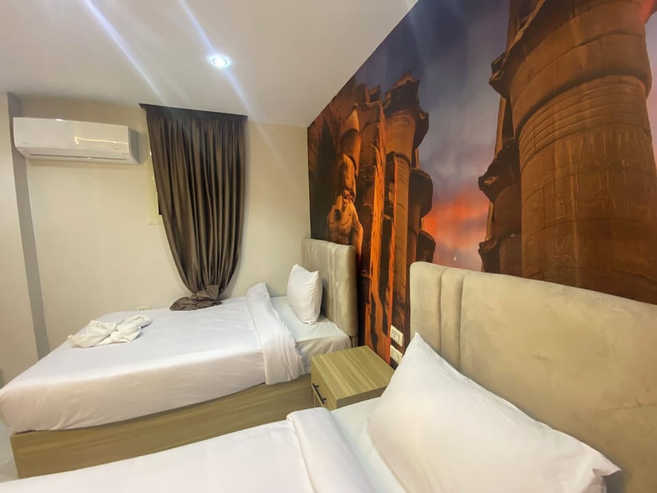 Deluxe Double or Twin Room | Minibar, laptop workspace, free WiFi, bed sheets