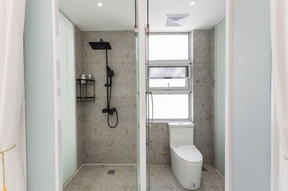 Senior Quadruple Room, Balcony, Garden View | Bathroom | Shower, free toiletries, hair dryer, slippers