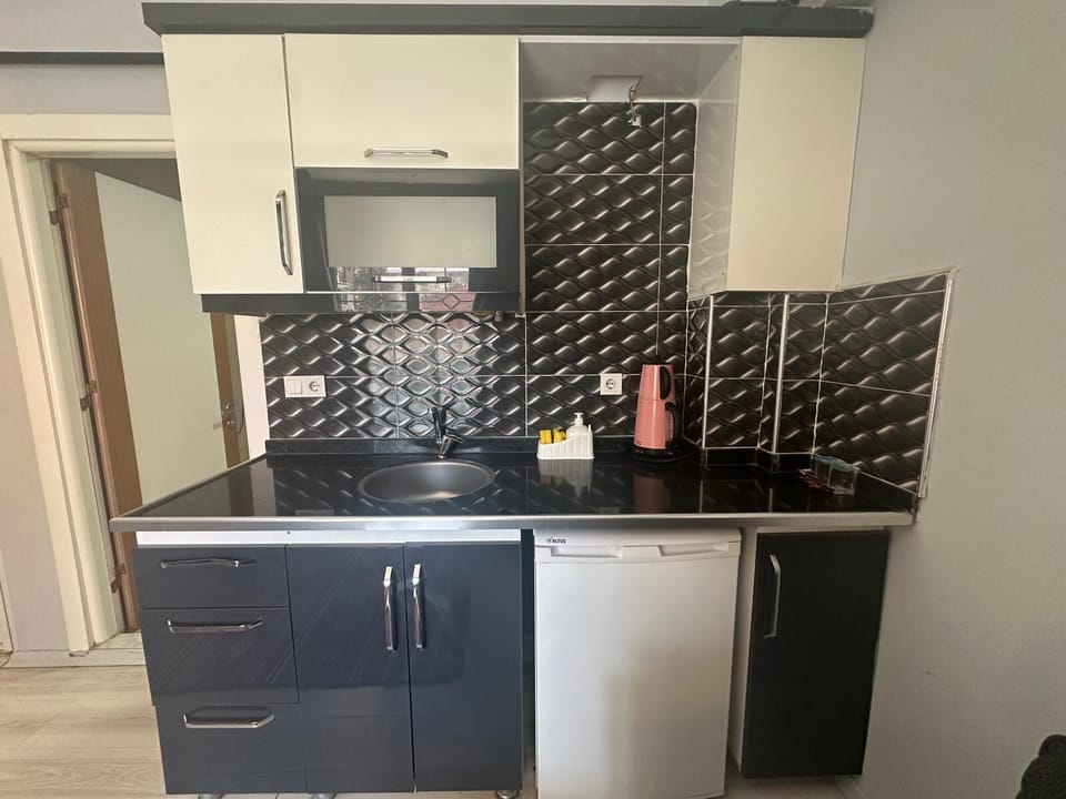 Comfort Suite, City View | Private kitchen | Fridge, electric kettle