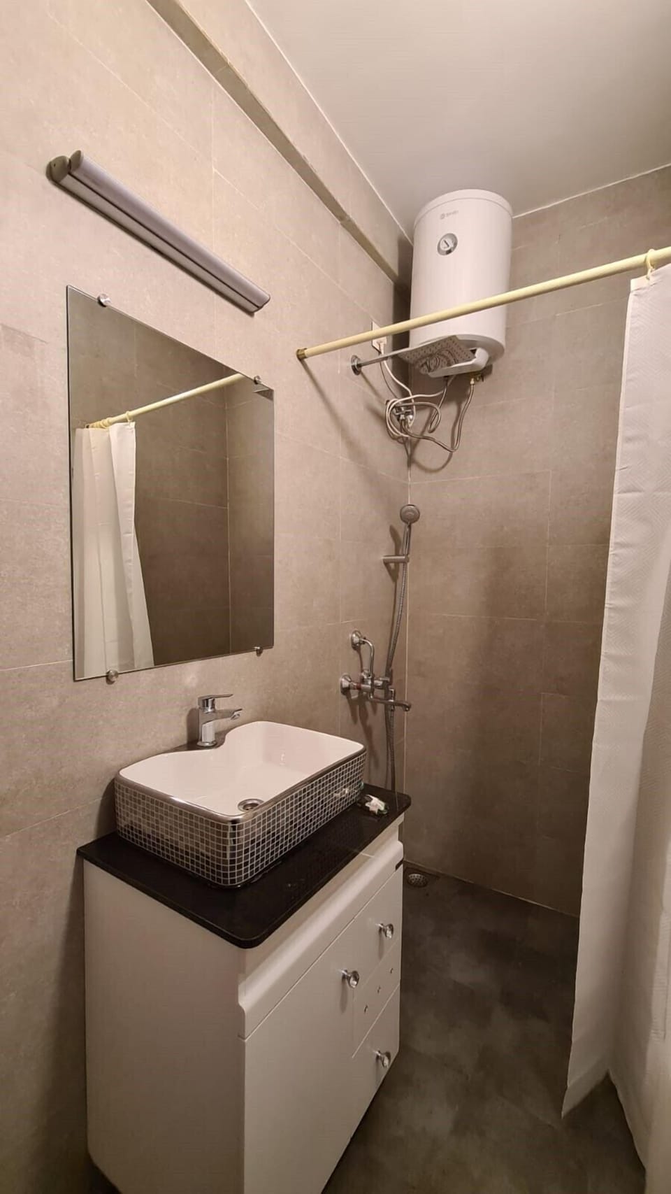 Studio Suite | Bathroom | Shower, towels, soap, toilet paper