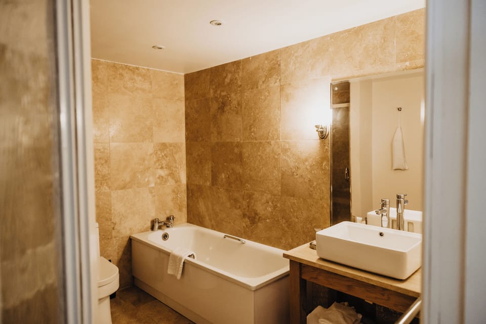 Standard Double Room | Bathroom | Combined shower/tub, hair dryer, towels, soap
