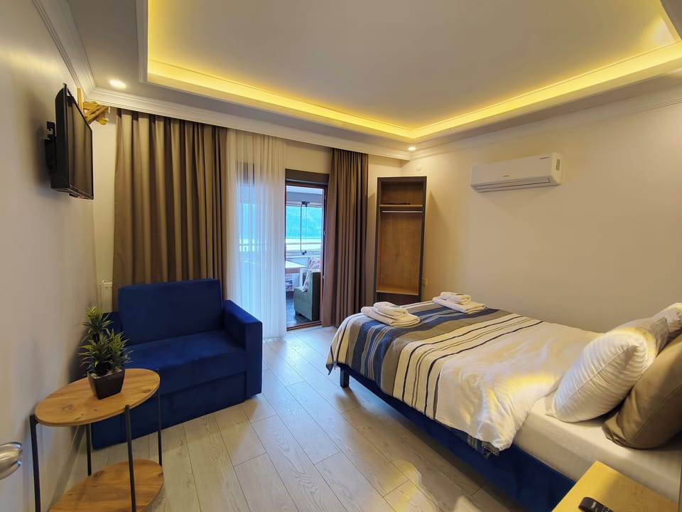 Deluxe Quadruple Room, 2 Bedrooms, Sea View | Premium bedding, individually decorated, soundproofing, free WiFi