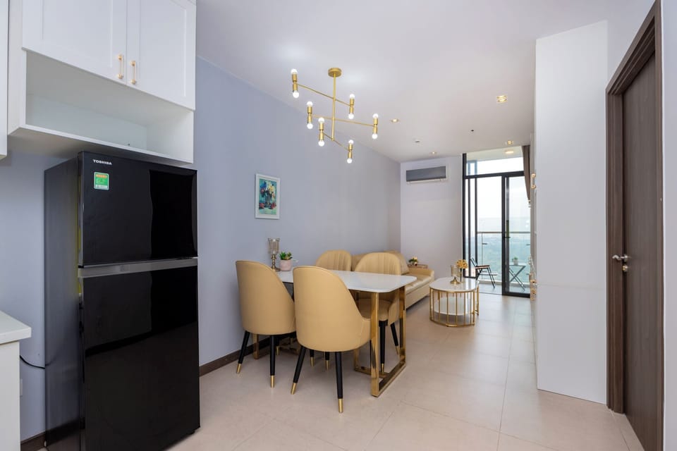 Deluxe Apartment, Partial Sea View | Living area | 32-inch Smart TV with cable channels