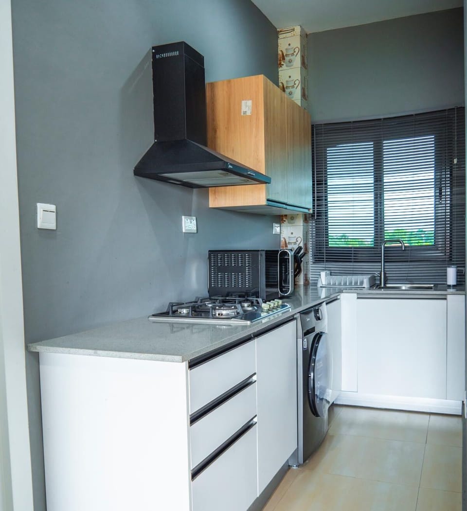 Apartment | Private kitchen | Full-size fridge, microwave, cookware/dishes/utensils