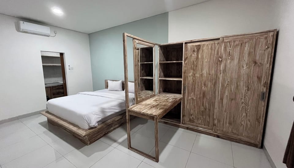 Standard Double Room | Iron/ironing board, free WiFi, bed sheets