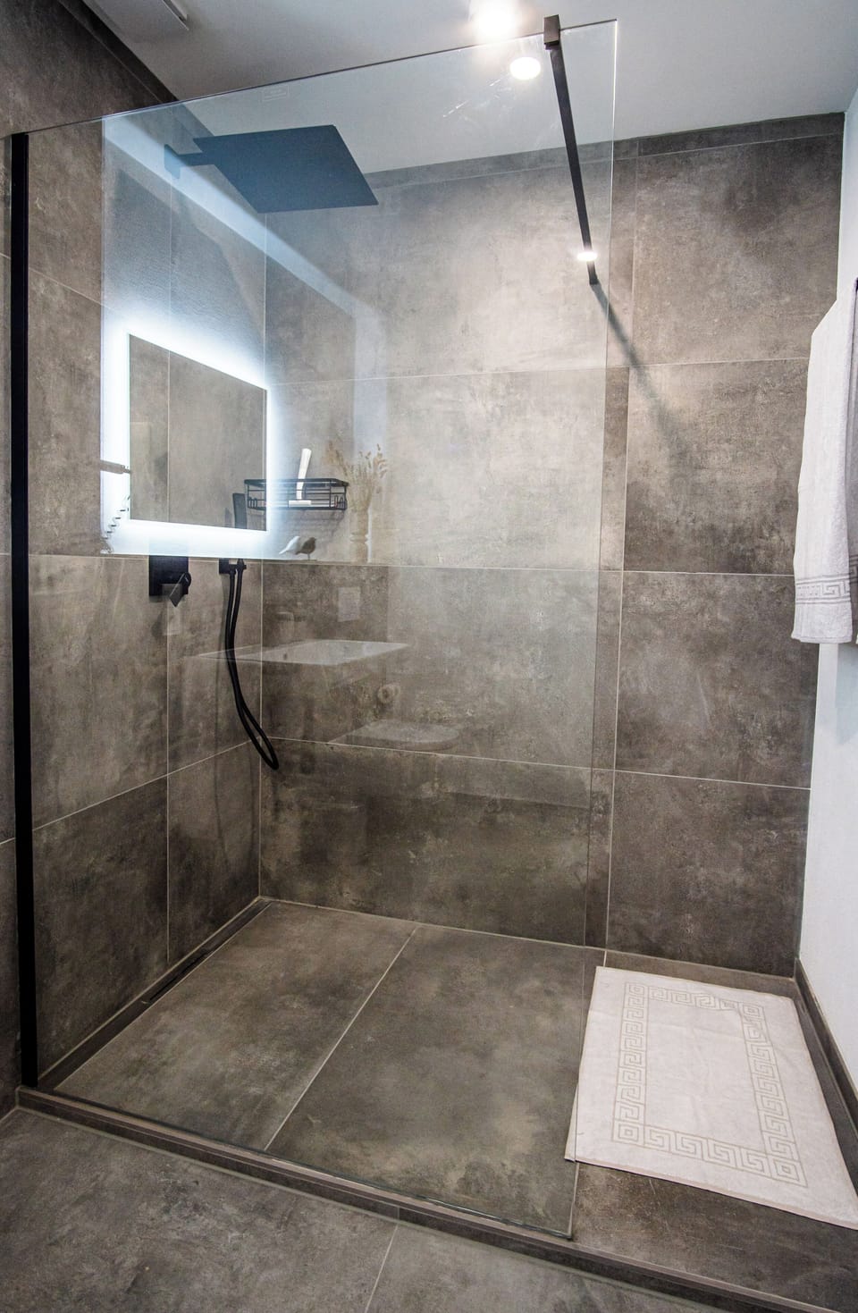 Shower, rainfall showerhead, hair dryer, heated floors