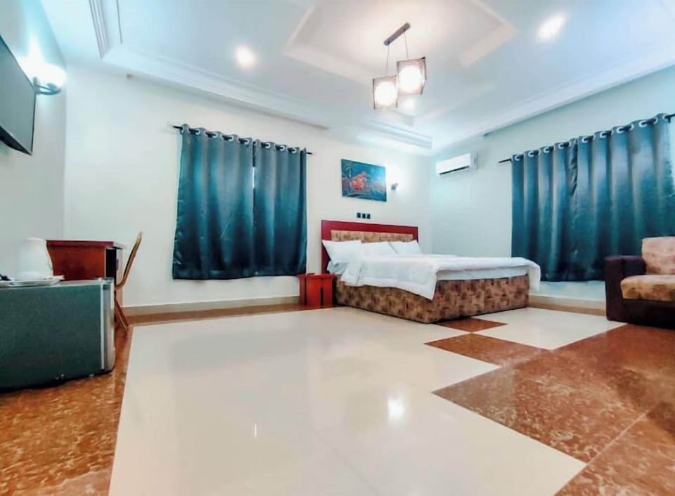Economy Room, Balcony, City View | Desk, laptop workspace, blackout drapes, soundproofing