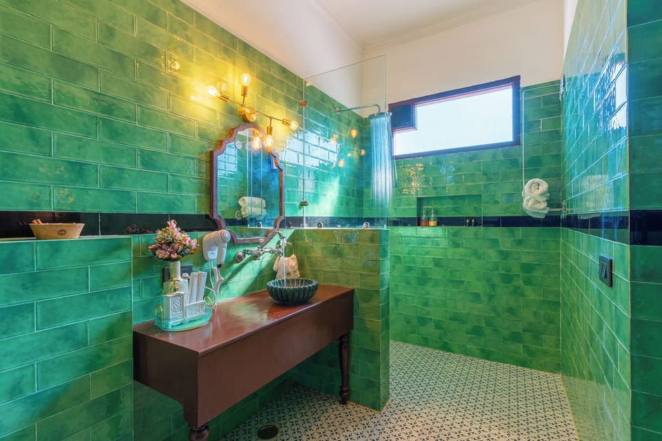 Premium Room | Bathroom | Shower, hair dryer, slippers, towels