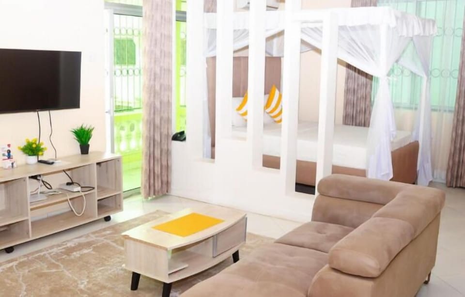Deluxe Double Room, City View | Desk, laptop workspace, blackout drapes, iron/ironing board