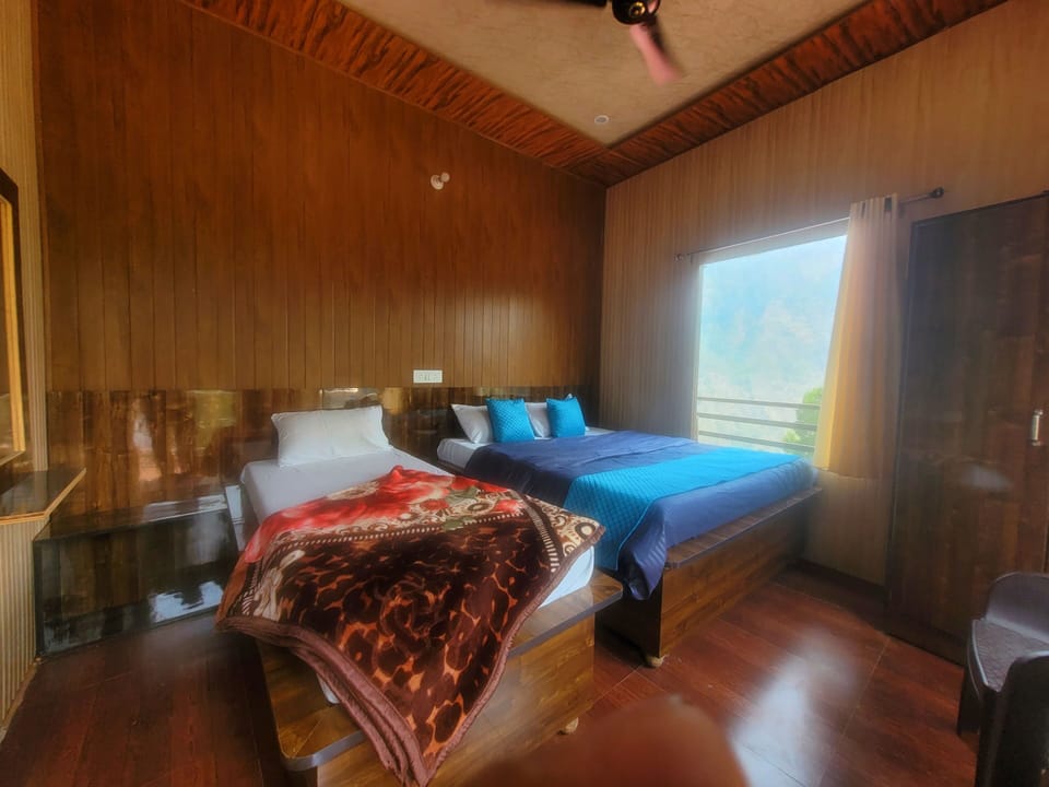 Deluxe Triple Room | Down comforters, memory foam beds, individually furnished, bed sheets