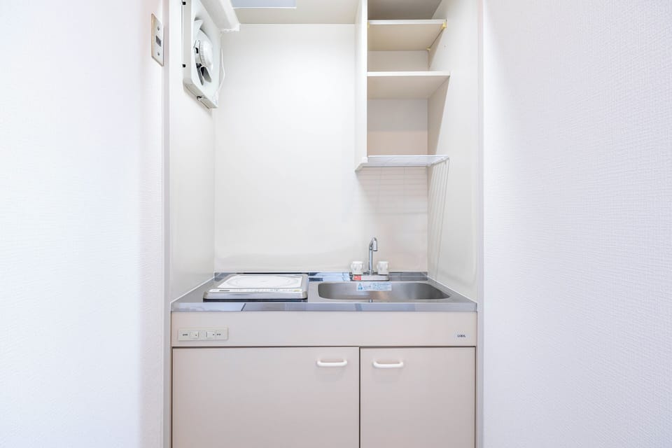 Deluxe Apartment, Balcony, City View | Private kitchen | Electric kettle, toaster