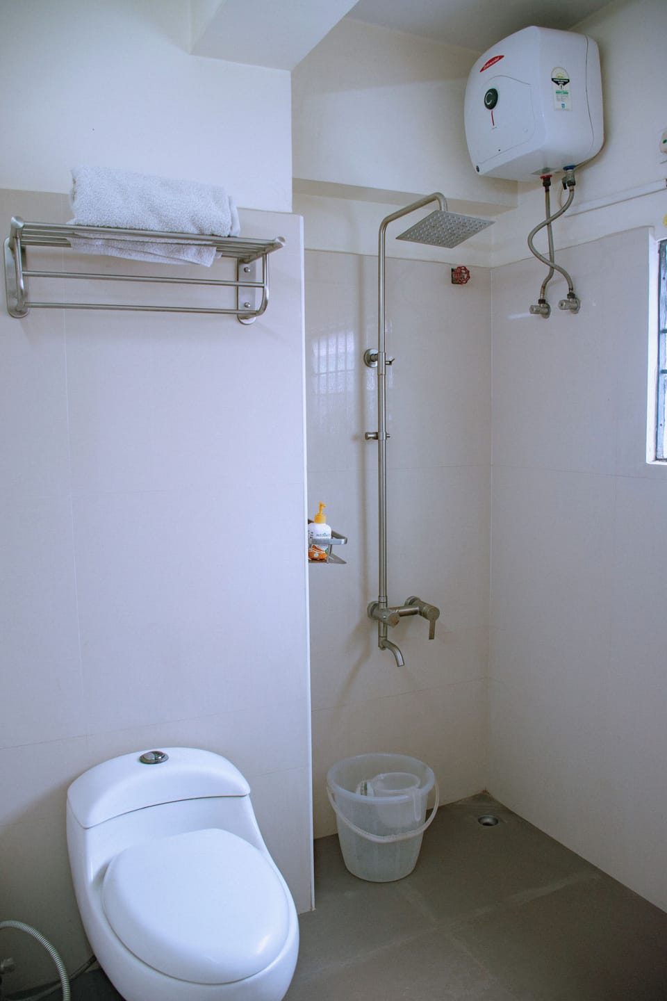 Deluxe Room | Bathroom | Shower, towels