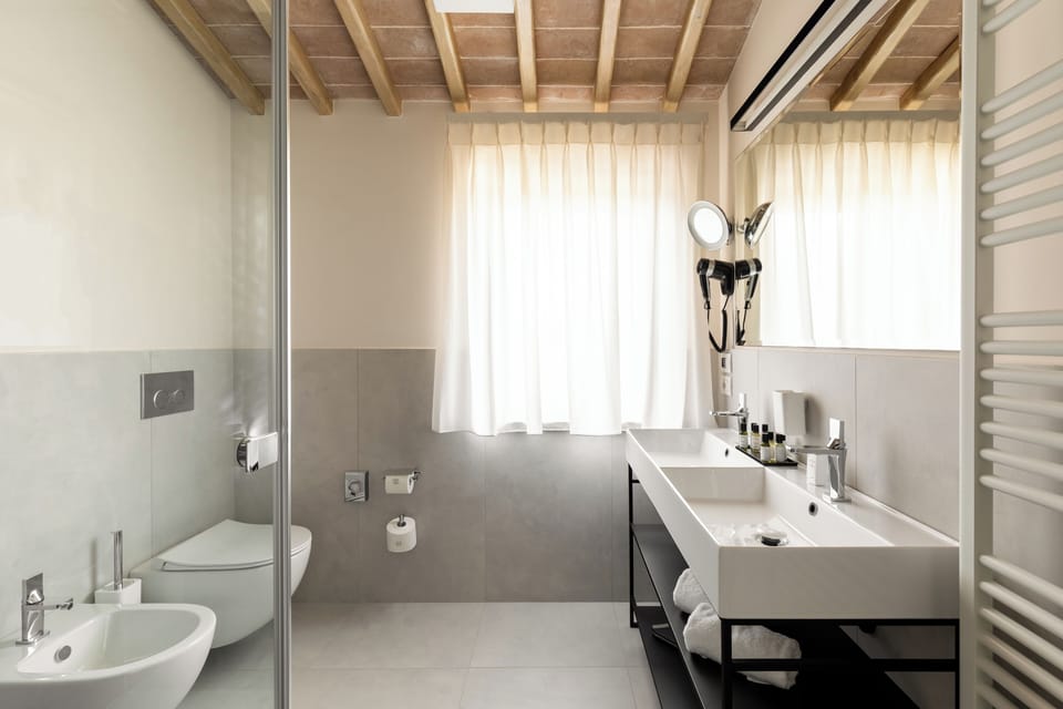Deluxe Room, 1 King Bed with Sofa bed, Private Bathroom, Hill View | Bathroom | Shower, hair dryer, bathrobes, slippers