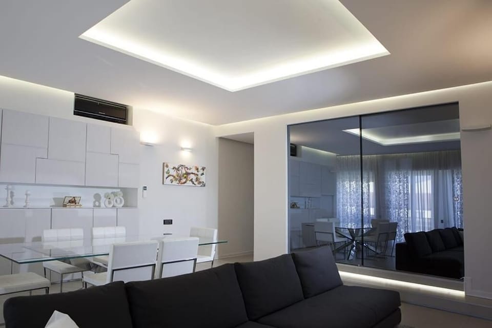 Luxury Apartment, City View | Living area | TV
