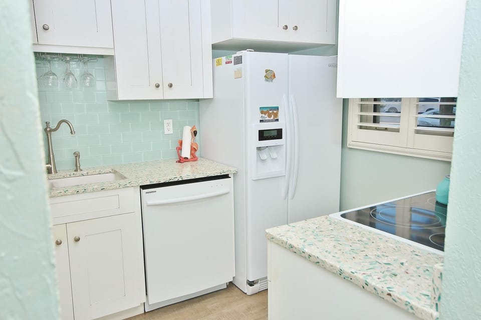 Condo, Multiple Beds (Sea Coast Gardens III 105) | Private kitchen | Oven, coffee/tea maker, toaster, blender
