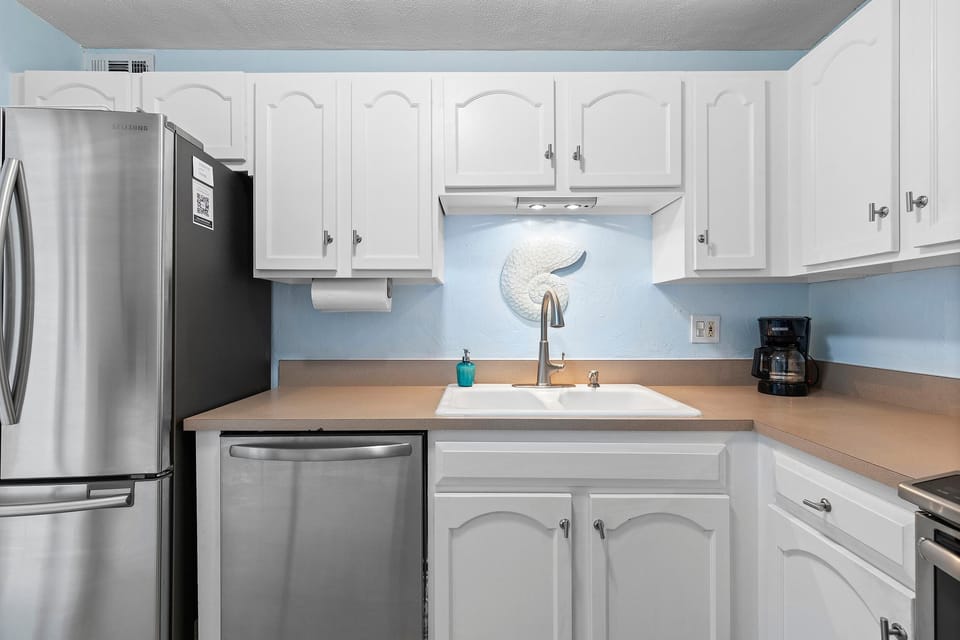 Condo, 1 King Bed with Sofa bed (Sea Coast Gardens III 215) | Private kitchen | Oven
